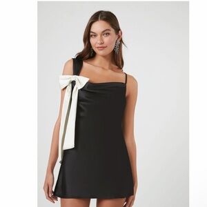 Forever 21 black satin dress with a white bow accent